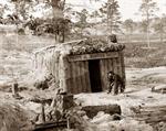 This photo, shot by Timothy H. O'Sullivan (1840-1882), shows Sutler's bomb-proof "Fruit and Oyster House" located in Petersburg, Virginia, during the siege of Petersburg (June 1864-April 1865).